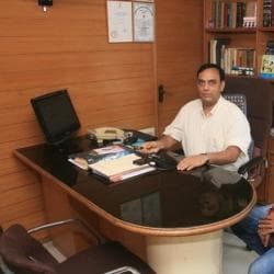 Dr Harshad Raval Md in ahmedabad